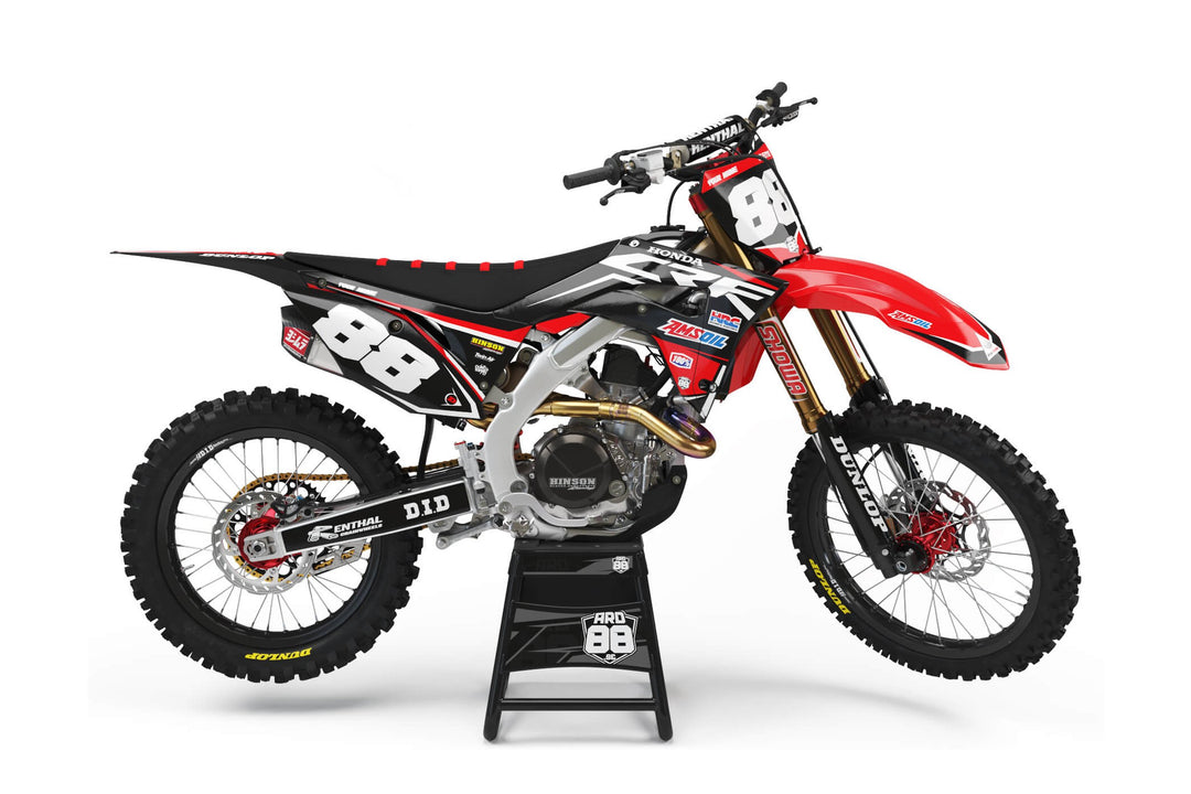 Honda crossmaskin med dekalkitet Amsoil Replica i rött, svart och gråvitt med siffran 88