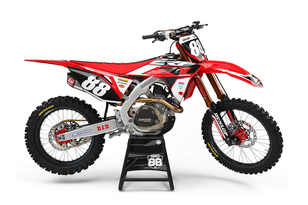 Röd Honda crossmaskin med dekalkitet Race Replica Racing Black: svarta och vita vinklade block, vita siffror 88 mot svart och svarta siffror på ljus frontplåt.