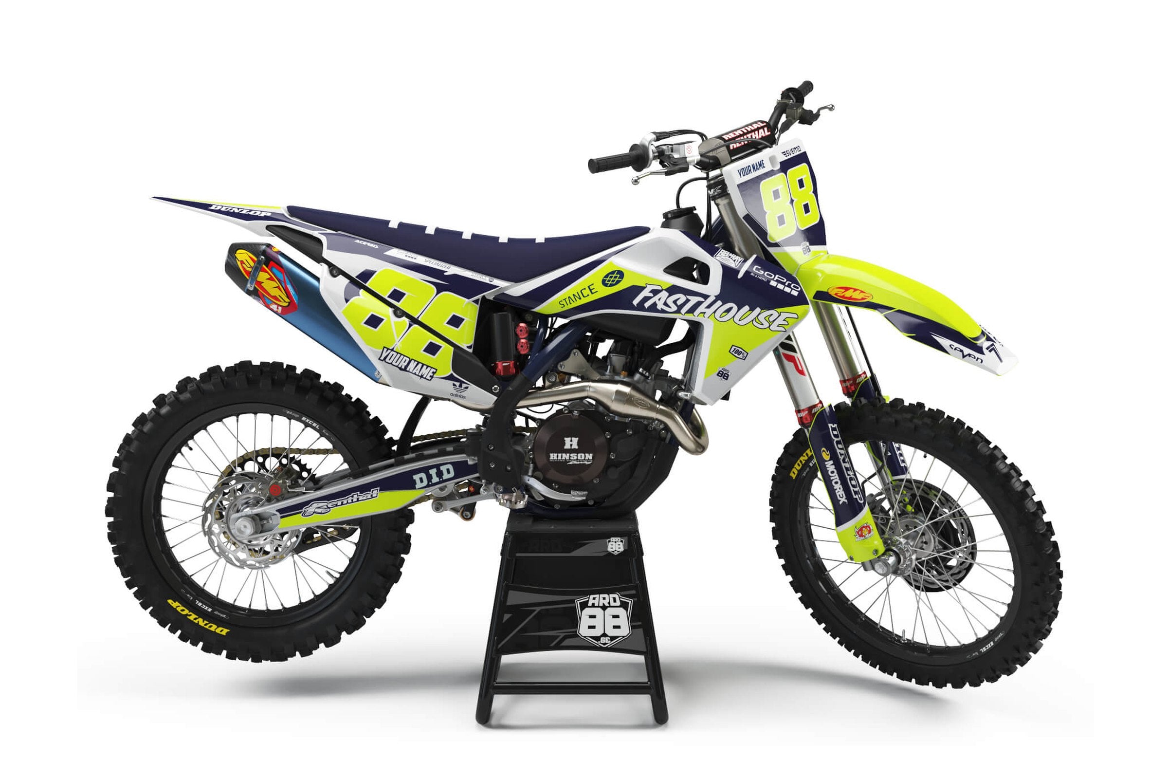 Husqvarna crossmaskin med dekalkitet Fasthouse Lime: marinblå och vit grafik med limegröna fält och limegröna siffror 88.