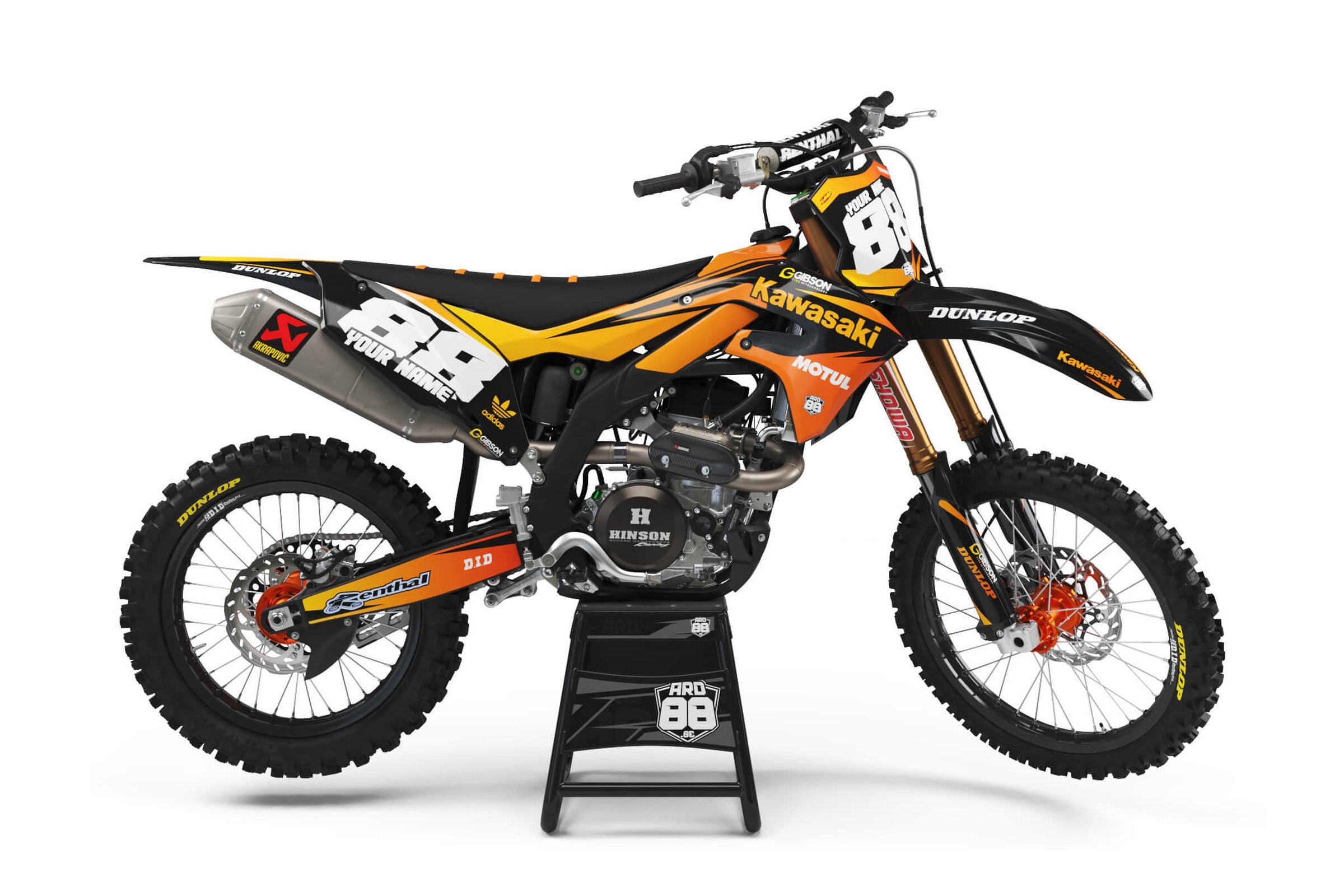 Kawasaki crossmaskin med dekalkitet Team Orange i svart med orange och gul toning, vita siffror 88 och orange fälgar