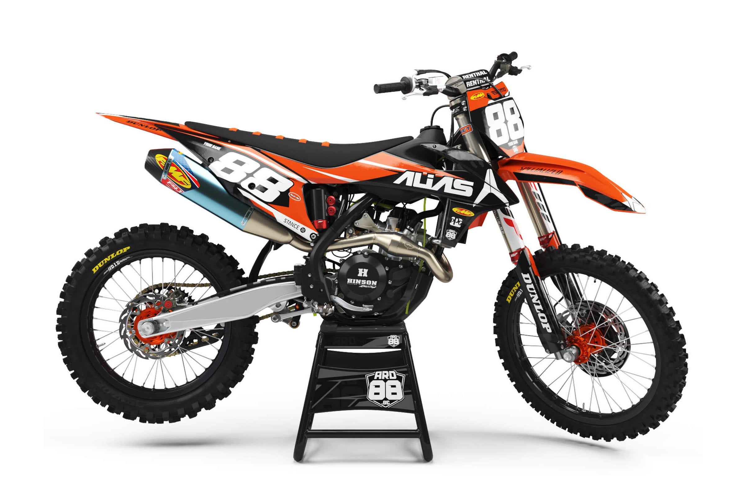 Orange och svart KTM-crosshoj med dekalkit Alias – raka orange och svarta fält, vit designtext och stora vita siffror.