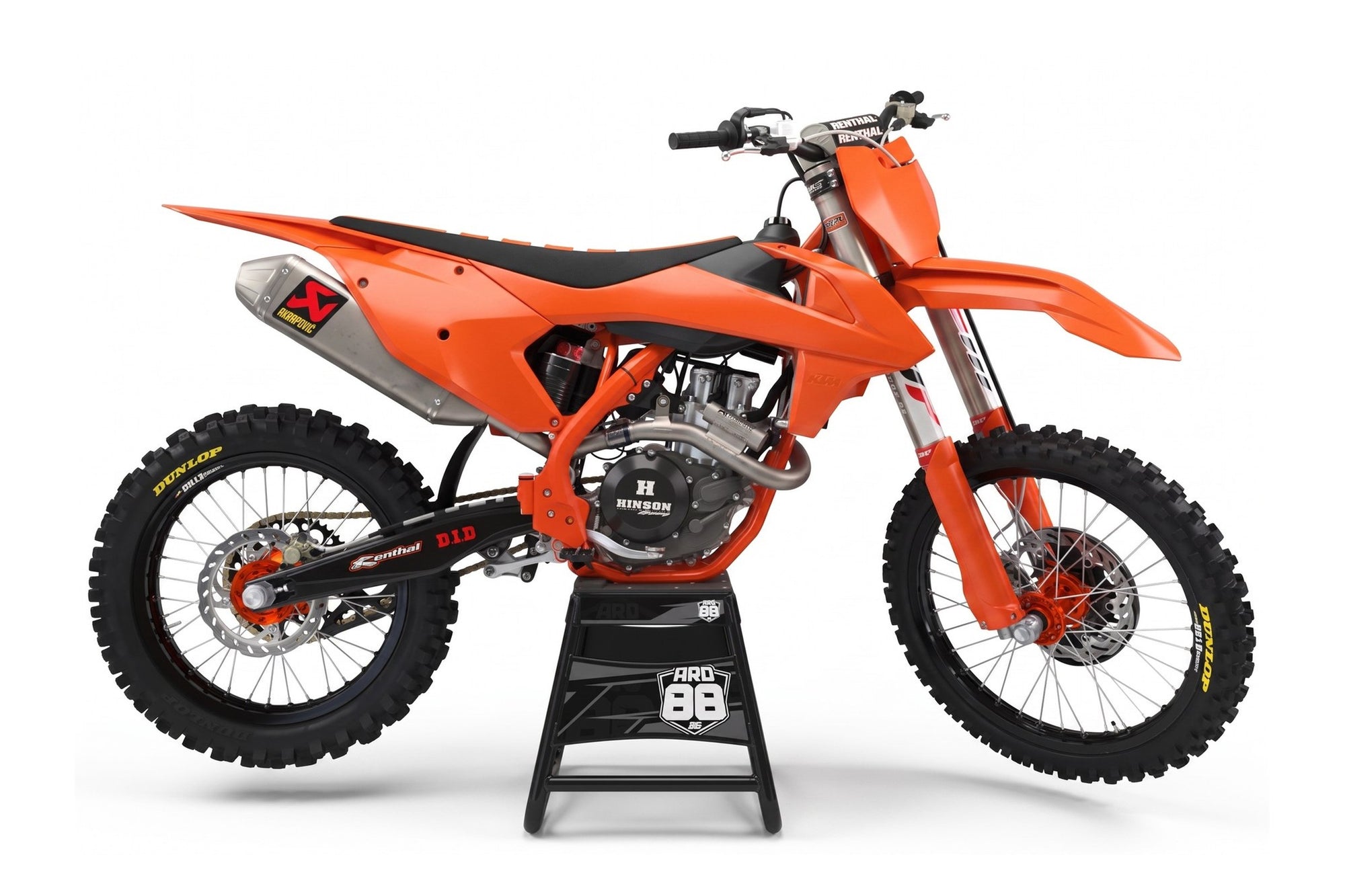 KTM crossmaskin utan dekalkit, gul-orange fabriksplast på ARD88-pallbock