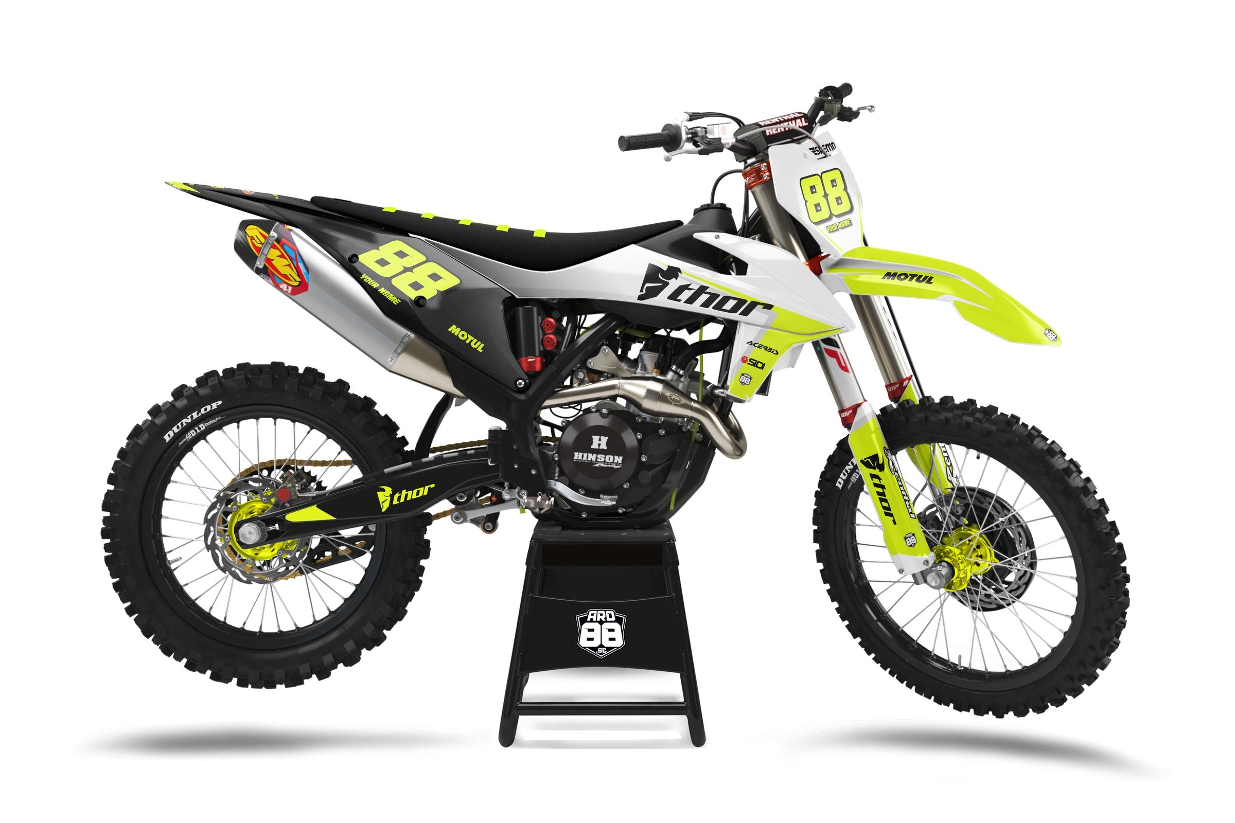 KTM crossmaskin med dekalkitet Transformation i vitt och svart med neongula siffror 88 och neongult fram