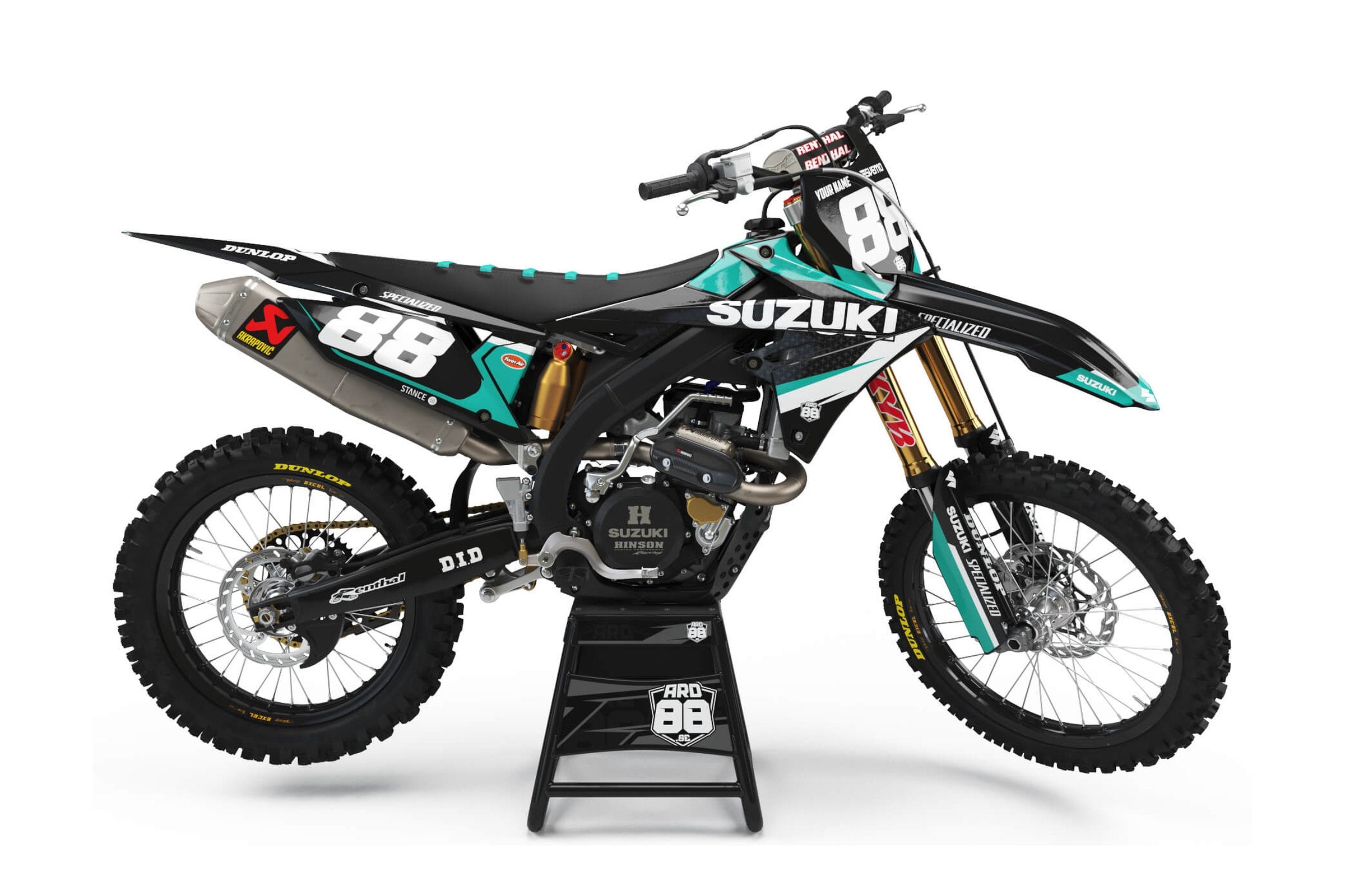 Suzuki-crosshoj med dekalkitet Special Teal i turkos, svart och vitt med siffrorna 88